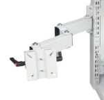 Close-up of a white adjustable metal monitor arm mounted to a vertical rail. The arm features multiple swivel joints and a square plate at the end for attaching a monitor, with a small black lever for adjustments.