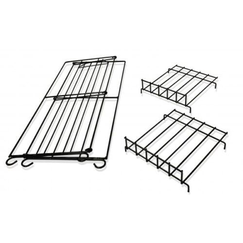 Displayed are three metal black racks. The larger one, a Vulcan SP model, is shown horizontally with wheels. The two knockdown versions stand upright on the right, each with four legs and a sleek grid design, ideal for stylishly organizing magazines.