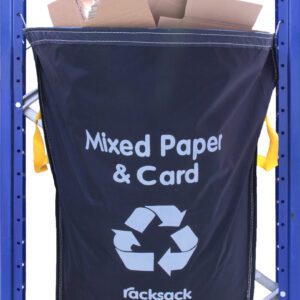 A blue recycling bag labeled Mixed Paper & Card with a recycling symbol is attached to a metal rack. The bag is filled with cardboard. Yellow handles are visible on the sides and bottom.