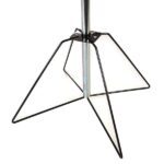 A close-up of a Vulcan WIRE 12 3/4 tripod stand reveals its metal frame, featuring a central pole and three triangular wireframe legs called POCK 3 rotators for stability, showcasing a simple and utilitarian design.