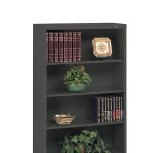 A black bookshelf with three shelves. It holds decorative items, including two sets of books with red and black covers, two decorative plates, a green plant, and a small leafy arrangement on the bottom shelf.