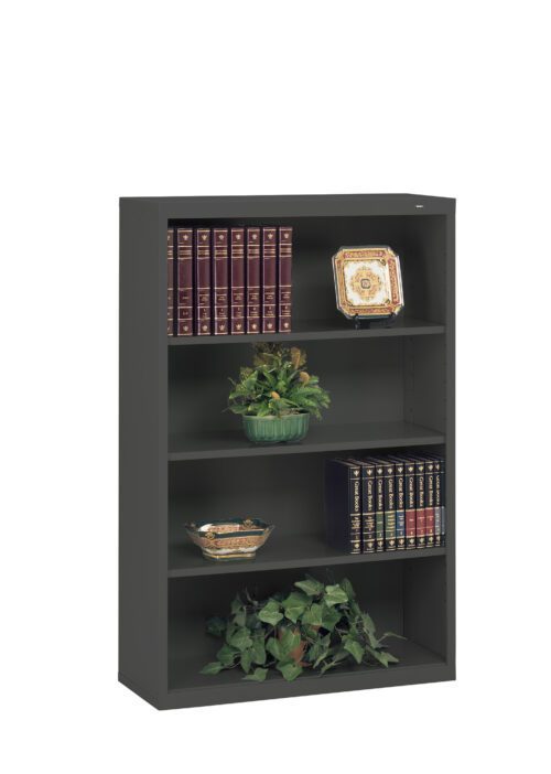 A black bookshelf with three shelves. It holds decorative items, including two sets of books with red and black covers, two decorative plates, a green plant, and a small leafy arrangement on the bottom shelf.