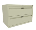 A beige, two-drawer filing cabinet with horizontal handles is pictured. The cabinet has a lock at the top center. It is shown against a plain white background.