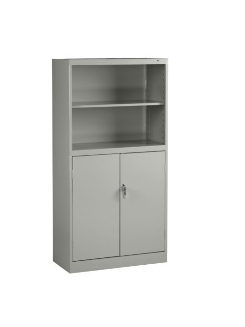 bfn9swkm40f9xrjnkvan.jpg A grey metal storage cabinet with an upper open shelf and a lower section featuring two lockable doors. The shelf inside the cabinet is adjustable, offering versatile storage options. The cabinet stands on a flat surface.
