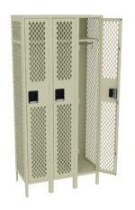 A set of three beige metal lockers with a diamond pattern. The middle locker is open, showing a shelf and hanging rod inside. The lockers have black rectangular handles.