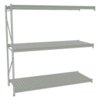 A grey metal shelving unit with three slatted shelves, positioned against a white background. The shelves are evenly spaced and the unit appears sturdy, intended for storage purposes.