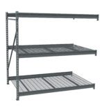 A three-tier metal storage rack with wire mesh shelves on a metal frame. The design is industrial, suitable for warehouses or garages, providing durable and sturdy storage space. The shelves are evenly spaced and appear empty.