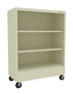 A beige, three-shelf metal storage cart with wheels is shown. The shelves are empty, and the cart has a sturdy, simplistic design suitable for office or home use.