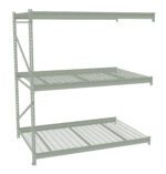 Metal shelving unit with three wire mesh shelves and side supports. The shelves are evenly spaced, providing sturdy storage options. The unit is light gray and designed for industrial or garage use.