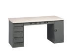A sturdy workbench features a light-colored tabletop with grey metal sides. The left side has four drawers and the right side includes a lockable cabinet. Several electrical outlets are installed on the front of the tabletop.