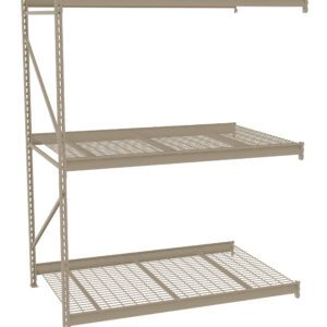 A beige metal storage rack with three shelves is shown. The bottom shelf has a wire design, while the top two have solid surfaces with perforations. The frame includes vertical support bars with holes for adjustable shelving.