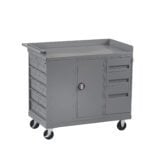 A gray metal rolling tool cart with multiple drawers and a central cabinet. It has swiveling wheels for mobility and a flat top surface. The cart features three small drawers on the left, two on the right, and a larger cabinet door in the middle.