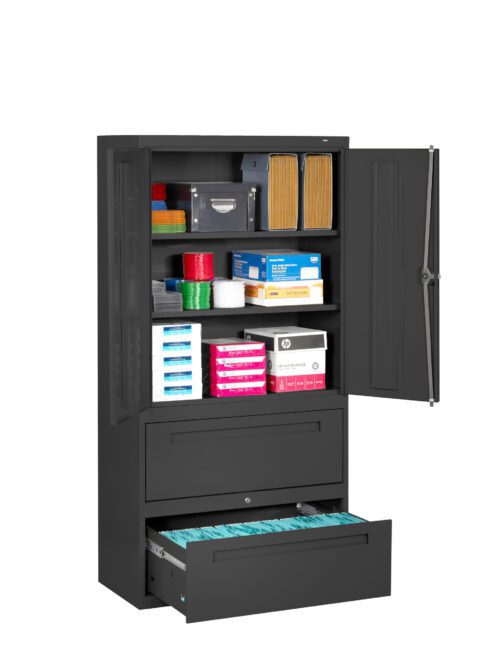 A black office storage cabinet with two upper doors open, revealing various supplies like folders, paper stacks, and boxes. Below, two drawers are partially opened, with the bottom drawer holding hanging file folders.