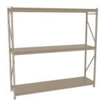A beige metal shelving unit with three slatted shelves, designed for storage purposes. The shelves are evenly spaced and supported by vertical beams with perforations. The overall structure is simple and utilitarian.