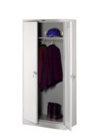 A white metal cabinet with two doors, one slightly open. Inside, a blue hard hat and two burgundy jackets hang on a rod. A pair of brown boots is on the bottom shelf. The cabinet has a simple and functional design.