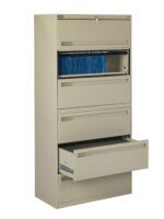 A beige metal filing cabinet with five drawers, partially open. The second drawer is slightly open, revealing a row of blue file folders. The fifth drawer at the bottom is pulled out completely. The cabinet is against a plain background.