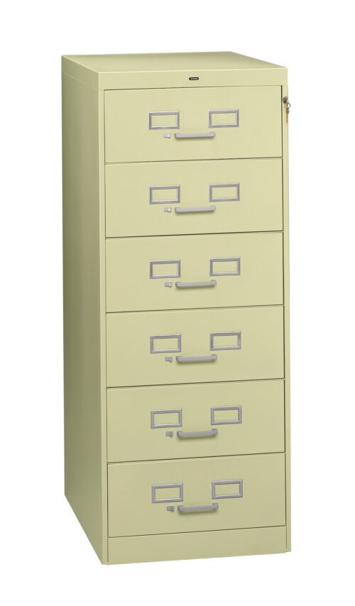 A tall, light green metal filing cabinet with six drawers. Each drawer features a handle and a label holder. The cabinet has a lock at the top right corner. It stands on a plain white background.