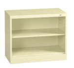 A beige, two-shelf, metal bookcase with an open front against a white background.