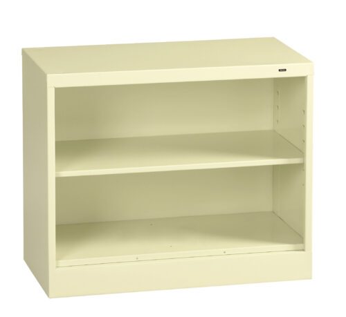 A beige, two-shelf, metal bookcase with an open front against a white background.