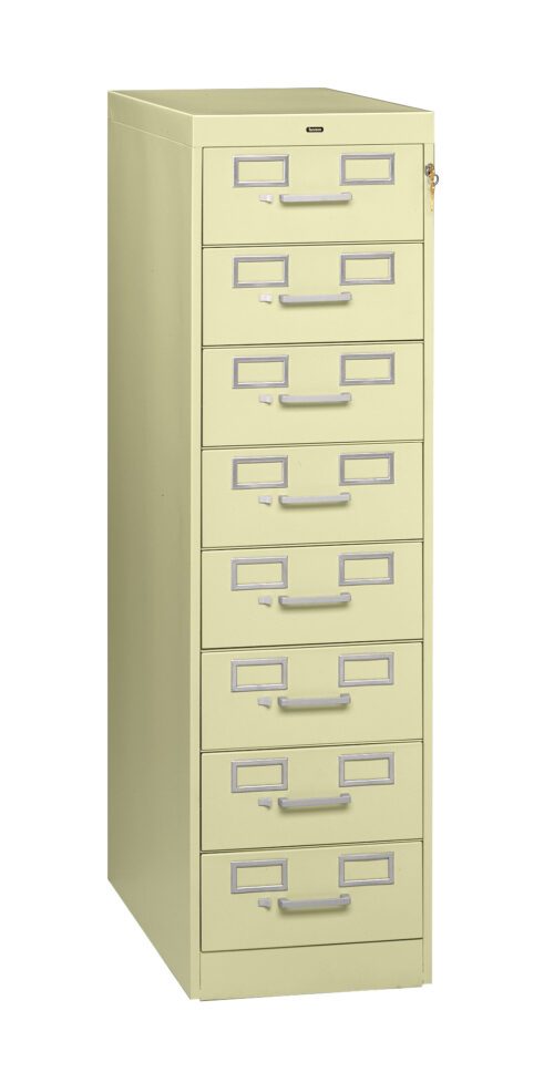 A beige seven-drawer filing cabinet with silver handles and label holders. The cabinet is standing upright and has a lock mechanism near the top.