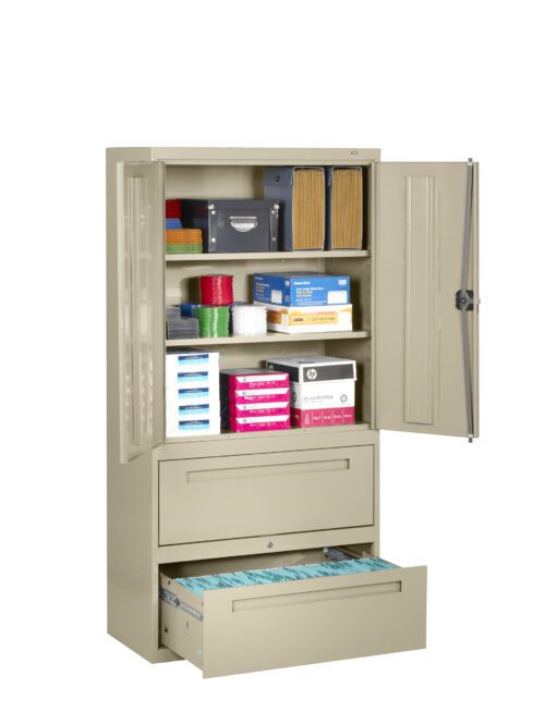 A beige metal cabinet with open doors and drawers reveals various office supplies. Shelves hold boxes, binders, and files, while two lower drawers are filled with hanging folders in one and more storage in the other.