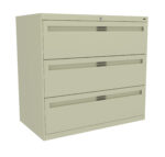 A beige, three-drawer filing cabinet with a lock on the top drawer. The cabinet has handles integrated into the drawer design, giving it a sleek and modern appearance. The drawers are closed.