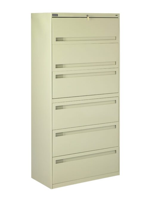 A beige, five-drawer filing cabinet stands upright. The cabinet has a lock on the top drawer and recessed handles on each drawer, designed for office or home storage.