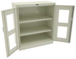 A metal storage cabinet with beige doors opened wide, revealing two interior shelves. The cabinet is empty and has a simple, industrial design.