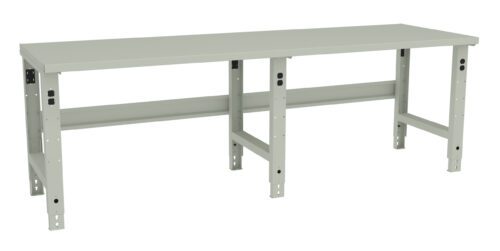 A long, light gray, metal workbench with a flat top and sturdy, adjustable legs. The design is simple and industrial, suitable for heavy-duty use in workshops or garages.