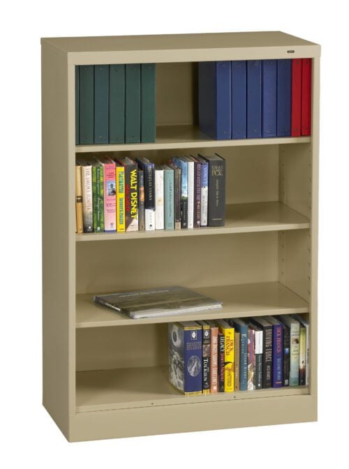 A beige metal bookshelf with three shelves, filled with various books and binders. The top shelf contains green and blue binders, the middle shelf has books of different sizes, and the bottom shelf has a mix of colorful books and a closed book lying flat.