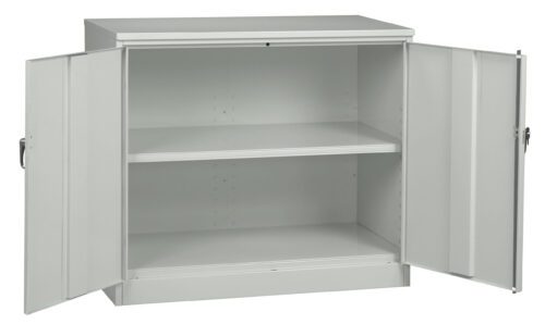 A metal storage cabinet with a plain design, featuring two doors opened outward. Inside, there are two adjustable shelves providing ample storage space. The cabinet is gray and has a minimalist, industrial appearance.
