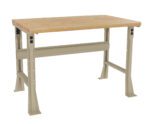 A sturdy tan metal workbench with a thick, light wood tabletop. The legs have multiple bolt holes for adjustable height. The design is simple and functional, suitable for a workshop or garage.