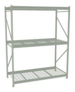 A large, industrial metal shelving unit with three shelves. The frame is light gray, featuring a sturdy grid design on each shelf. The unit is empty and positioned against a white background.