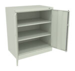 A light gray metal cabinet with two doors, one open and one partially open, revealing three empty shelves. The cabinet has a simple rectangular design suitable for storage in an industrial or office setting.