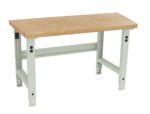 A sturdy workbench with a wooden top and light gray metal legs. The bench is designed for industrial or garage use, featuring adjustable legs and a reinforced support bar underneath.