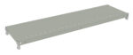 A long, gray metal shelf with multiple small holes along its surface, viewed from a slightly diagonal angle. The shelf is plain and has no visible objects on it.