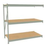 A three-tiered industrial metal shelving unit with wooden shelves, shown against a plain white background. The shelf supports are a light gray color, and the wooden surfaces are a natural brown shade.