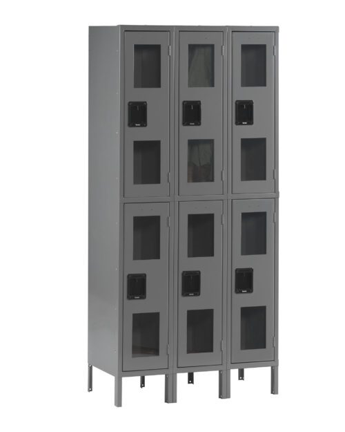 ihfduesecllrzdgud74s.jpg A gray metal locker unit with two rows and three columns, featuring six compartments in total. Each locker has a black handle and transparent window panel, allowing visibility of the contents inside. The unit stands on four sturdy legs.