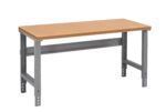 A sturdy workbench with a wooden top and adjustable metal legs. The design is simple and industrial, with a clean rectangular surface and a support bar between the legs for stability. The legs have multiple holes for height adjustment.