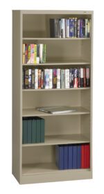 A tall, beige bookshelf with five shelves. The top three shelves hold rows of various books. The fourth shelf has a large closed binder. The bottom two shelves contain colorful binders and a stack of books.