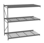 A metal storage shelf unit with three wire mesh shelves and a solid top shelf. The unit is freestanding and industrial in design, suitable for organizing or storing items in a warehouse or garage setting.