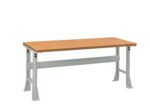 A simple workbench with a wooden tabletop and sturdy metal legs. The metal frame is gray and features adjustable height settings. The bench has a clean and minimalistic design, suitable for various tasks or projects.