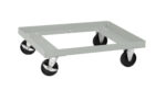 A gray metal dolly with four swivel casters, designed for moving heavy items. The dolly has an open square frame with a minimalist design. The wheels are black and appear sturdy.