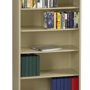 A beige metal bookshelf with five shelves. The top three shelves hold various books, arranged upright and stacked. The bottom two shelves contain binders in green, blue, and red. A single magazine lies on the middle shelf.