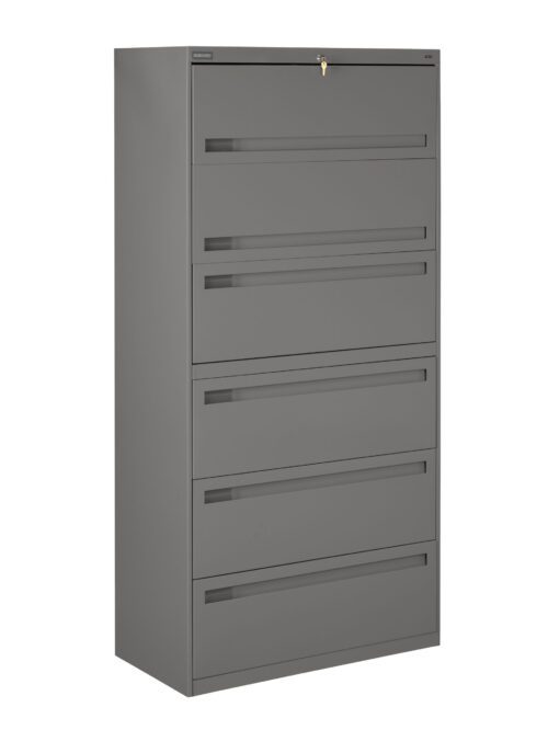 A tall, grey metal filing cabinet with five drawers, each equipped with handles. The top drawer has a visible lock with a key. The cabinet stands alone against a plain white background.