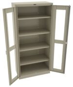 A beige metal cabinet with glass doors standing open, revealing four empty shelves inside. The cabinet is set against a plain background.