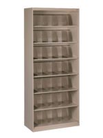 A beige metal shelving unit with six shelves, each containing multiple clear plastic dividers or holders. It is empty and stands against a plain white background.