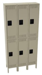 A set of six beige metal lockers arranged in two vertical columns of three. Each locker has a black handle and small ventilation slots near the top and bottom. The lockers are freestanding, with visible legs at the base.