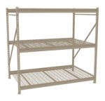 A beige, three-tiered metal storage shelf with a grid design is shown against a plain white background. The unit consists of a sturdy frame and lacks any stored items.