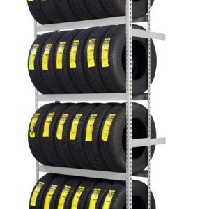 A metal shelving unit holds three rows of stacked black tires. Each tire has a yellow label on its tread, indicating specifications or pricing. The shelves are evenly spaced, and the setup appears organized and clean.